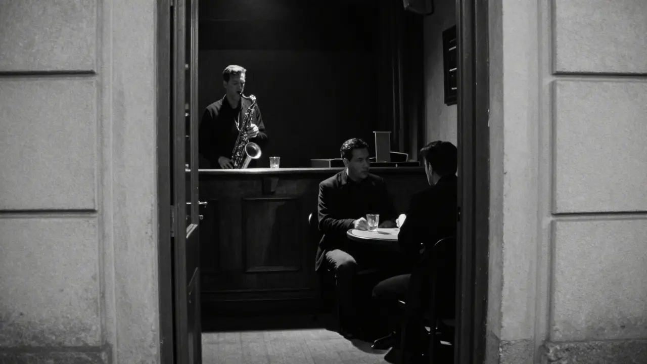 A dimly lit jazz club entrance in Brera with shadows of two people listening in the corner.